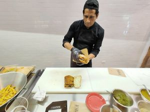 Watch them make your meal while you wait through viewing glass at N'Hambù in Salerno