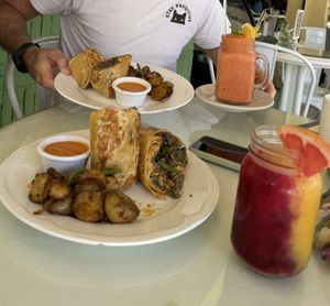 Vegan breakfast wrap with quinoa, potatoes, green beans and rojo saucee  at Mangata in Puerto Morelos