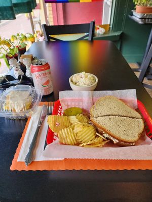 Enjoying a delightful lunch comprised of "Turkey Special " sandwich, homemade potato salad, lemon cake dessert, and exceptionally friendly service. at The Gentle Giant Cafe in Pitman