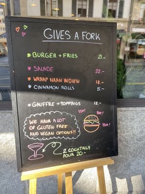 Outdoor sign at Gives a Fork in Geneva