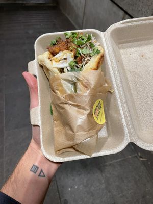 Hazey Naan 18.- (Signature Mushrooms, Sweet Soy, Crunchy, Peanut Satay Sauce, Crispy Rice Noodles, Wombak Slaw, Coriander)  at Gives a Fork in Geneva