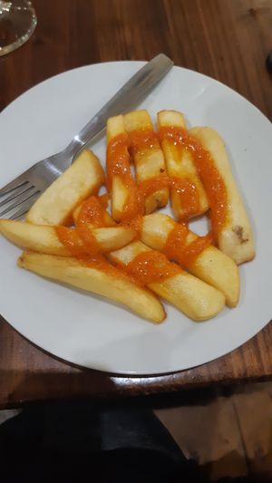 Chips with sauce at El bar de Nino in Granada