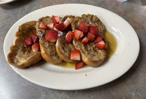 French Toast topped with strawberries!   at Depot Cafe in Frisco