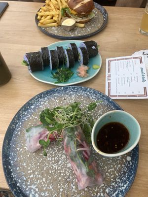 Sushi roll, spring Rolls, burger  at Pele Surf Shack in Hook Of Holland