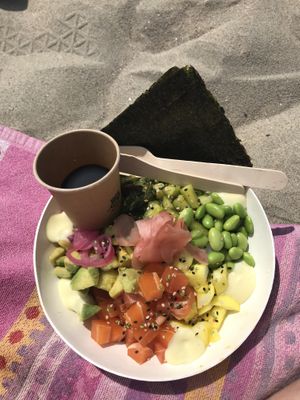 Rice bowl with zalmon, avocado, veggies, edamame and seaweeds  at Pele Surf Shack in Hook Of Holland