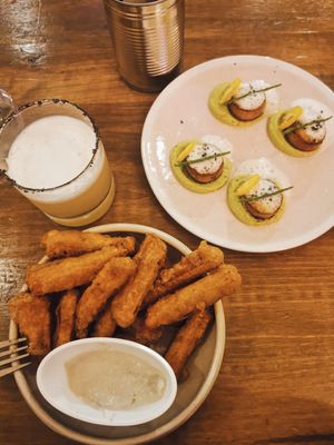 Sweet potato bites and vieiras at O Gambuzino in Lisbon