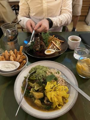Didn’t get a photo of the starters because they were gone too quickly! We got the tacos and the falafels and they were incredible. Pictured is our mains - the tempeh and the curr at O Gambuzino in Lisbon