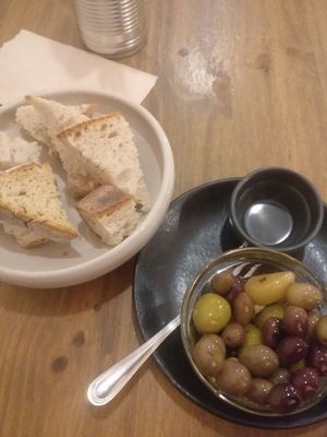 Olives and bread as a starter at O Gambuzino in Lisbon