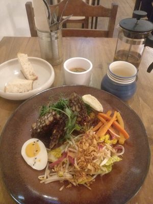 Ginger tea and Gado Gado as main dish, with delicious peanut sauce at O Gambuzino in Lisbon