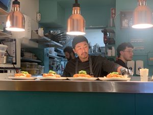 From the restaurant you openly see the kitchen and all the activity to make the dishes pretty   at O Gambuzino in Lisbon