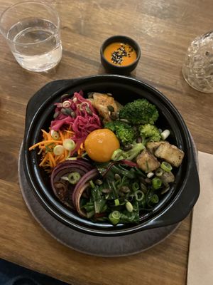 Bibimbap with vegan egg yolk  at O Gambuzino in Lisbon