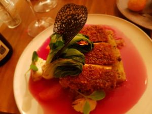 Tofu Katsu.  Marinated in Açorean black tea, panko-battered with a brandy & black tea reduction, Portuguese quinoa with nuts, pak-choy, grapefruit, purple cabbage & orange juice. at O Gambuzino in Lisbon