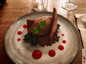 Belgian chocolate mousse, baked cocoa meringue, chocolate crumb and blackberries. at O Gambuzino in Lisbon