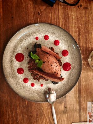 Belgian chocolate mousse, baked cocoa meringue, chocolate crumb and blackberries. at O Gambuzino in Lisbon