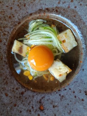 Corn consomme with "egg yolk" at O Gambuzino in Lisbon