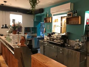 Open kitchen and bar with 100% arabica BIO coffee, fully vegan wines and their own version of cocktails like the Espresso Martini Algarvia.  at O Gambuzino in Lisbon