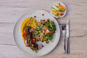 Ta'ameya - egyptian style falafels, orange & sesame relish, almonds, roasted carrot & white bean hummus, turnip pickled in beetroot. Salad of mixed leaves, dukkah, tahini dressing at O Gambuzino in Lisbon
