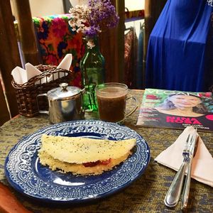 Divine tapioca accompanied by hot chocolate at Gauri Cafe in Sao Paulo