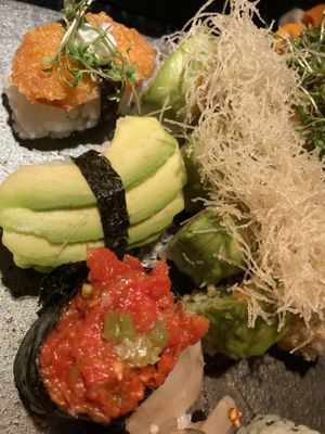 Gunkan al pomodoro semi secco, nigiri al tofu fritto e avocado at Karma Sushi in Copenhagen