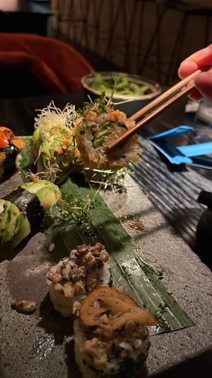 One bit at a time. The ambience is delightful.   at Karma Sushi in Copenhagen