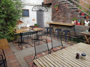 Outdoor seating at the back at Pancho in Daylesford