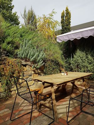 Outdoor seating at the back at Pancho in Daylesford