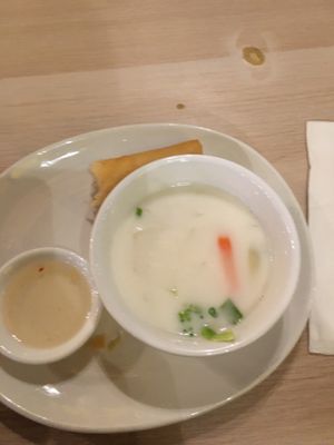 Half eaten spring roll and coconut soup! at Kajohn Thai Cuisine in Halifax