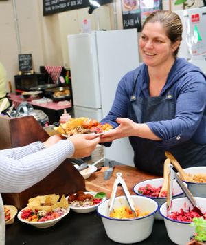 Ananda serving up more delicious vegan goodness. at Vege Pulse in Auckland