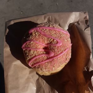 vegan strawberry cheesecake doughnut - filled with frosting at Goldeluck's Bakeshop in Croydon