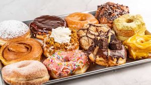 Baker's choice assorted dozen doughnuts. including a  cronut, a fritter, and filled donuts.  at Machino Donuts - Bloor St in Toronto