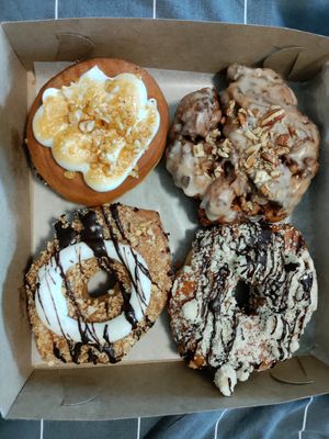 Fluffers nutter (top left) and maple sweet potato fritter (top right) are a must try! at Machino Donuts - Bloor St in Toronto