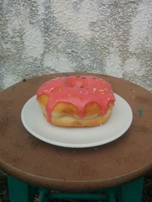 Simpson donuts raspberry and sprinkle at Machino Donuts - Bloor St in Toronto