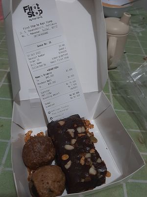 For the price of a full meal for two from a standard restaurant in town, you can get two tiny protein balls and a slice of brownie. at First Stop in 