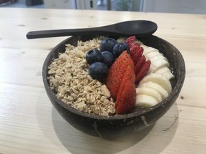 Acai Bowl with müsli and fresh fruit at Nectare in Bologna