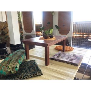 Upstairs seating area and the kitchen- view over central Ubud with sunset at Urban Jungle in Ubud