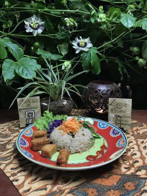 New! Nasi Goreng Vegan original (Fried rice with soy sauce and vegetables, served with fried Tofu and Temphe and some raw vegetables.  at Urban Jungle in Ubud