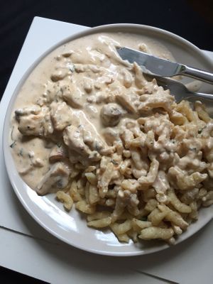vegan ‚Spätzle‘ (swabian pasta) with mushroom cream sauce and fake meat stripes  at Deluxe in Stuttgart