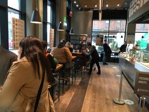 Sseating inside at fresh&co - 10th Ave in New York City