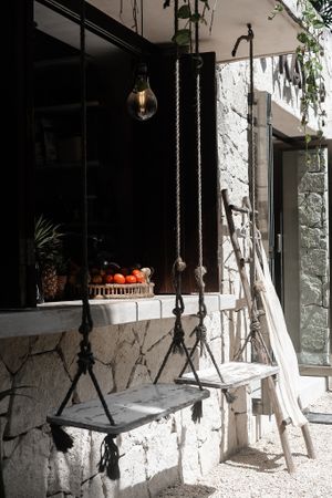 Swing seating at Los Bowls de Guadalupe  in Tulum