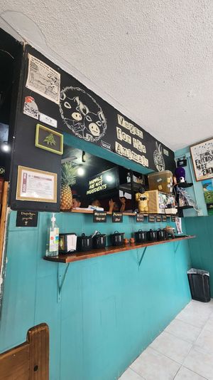 Hot sauce/condiment self serve at El Bajón Vegano in Tulum