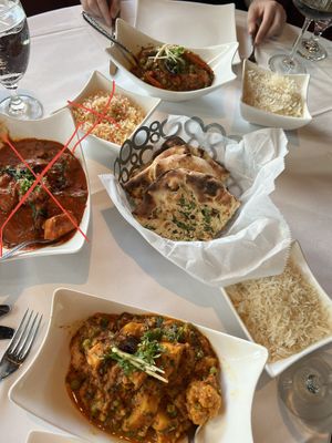 X’s mark not vegan. Got the garlic naan made without butter. Top: tikka masala. Bottom: aloo gobi  at 21 Spices in Naples