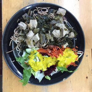 Warm weather noodles plate & salad. Soba noodles, tofu and greens.  at Oh Happy Days Vegan Cafe in Altadena