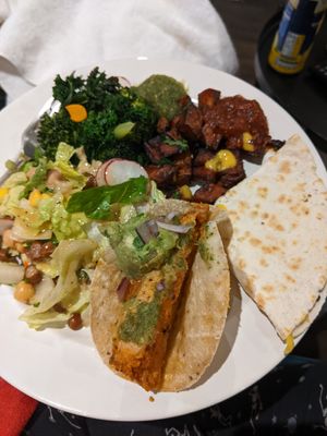 Avocado salad, greens, sweet potato, a taco and a quesadilla (takeaway assembled at home) at Wahaca in Brighton
