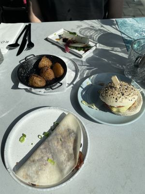 Potatoes, pak choi, Rozey burger, oyster mushroom pancake  at Rozey in Rotterdam