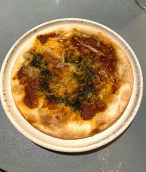 Mini pizza with vegan cheese at Rozey in Rotterdam