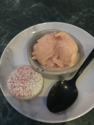 Orange ice cream and a macaron at Rozey in Rotterdam