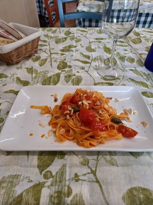 Tagliatelle di mais con pomodorini, capperi e mandorle at Locanda Reloup in Isasca
