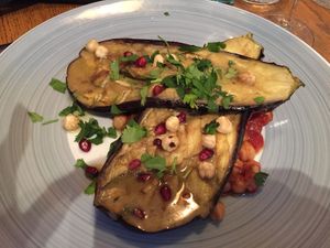 Aubergine - aubergine filled with with tahini, chickpeas, pomegranate and fresh coriander and hazelnutShort description at Paisan in Hilversum