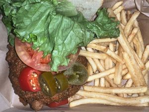 The B. Anthony with fries - Veggie Burger with Avocado, Pickled Jalapeños, Meatless Hot Sauce 🌶 and Hummus on Ciabatta👌  at The Gate House in Rochester