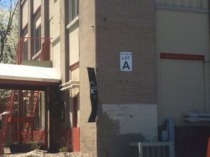 Parking in the back of the building and sides- Parking lot A is nearby outside the courtyard  at The Gate House in Rochester